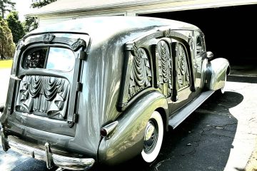 1939 LaSalle Masterpiece Carved Panel Hearse by Sayers and Scovill passenger side rear quarter view
