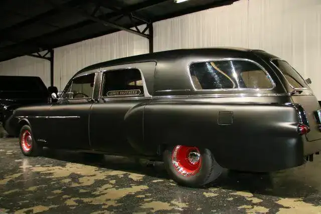1952 Packard Henney Hearse Hot Rod rear driver side view as seen in 2022