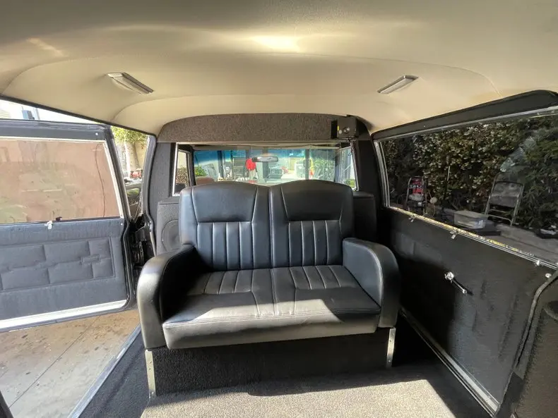 1972 Cadillac Superior Hearse Limousine inside rear, rear-facing bench seat