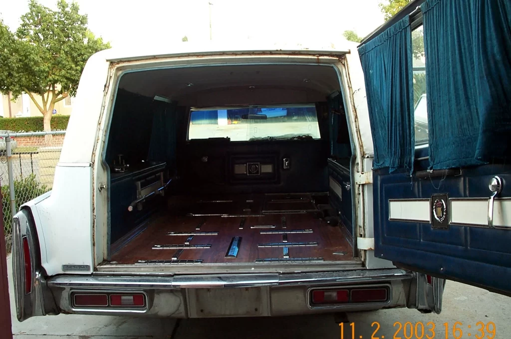 1976 Cadillac Superior Hearse Ambulance Combo rear view with door open