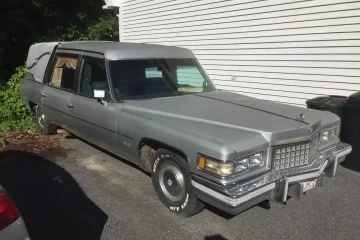 1976 Cadillac Superior Crown Hearse front passenger quarter view