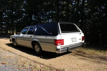 1980 Mercury Colony Park Thacker First Call Hearse driver side rear quarter view