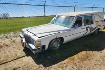 1983 Cadillac "5th Realm" Haunted House Hearse driver side front view