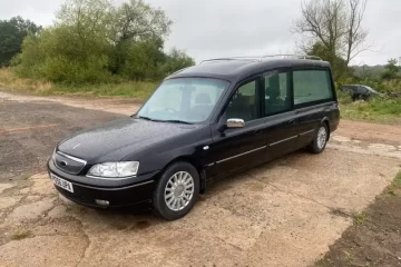 2006 Ford Hearse by Coleman Milne front passenger side