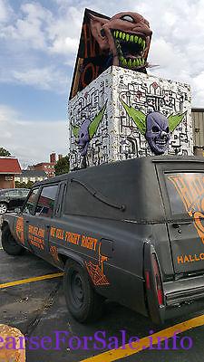 1978 Cadillac Hearse - Halloween Outlet's 'Jack In The Box' Hearse by Distortions Unlimited driver side rear quarter view