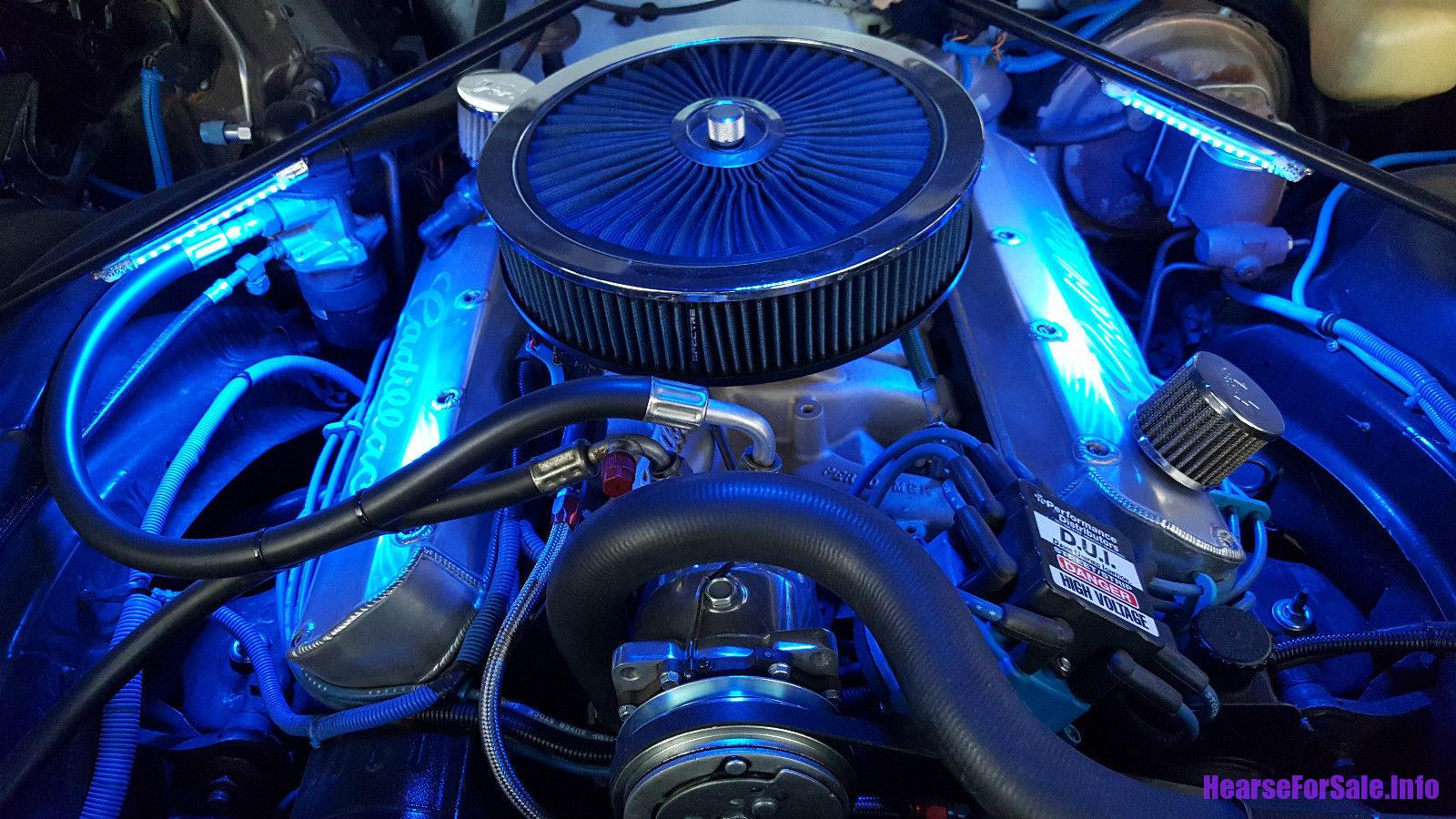 1975 Cadillac Miller-Meteor 3-Way Hearse engine under LED lights