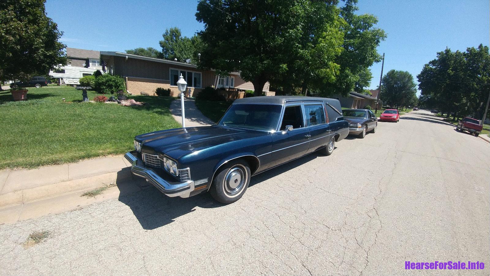 1973 Pontiac Grand Ville Superior Hearse, driver side front quarter view