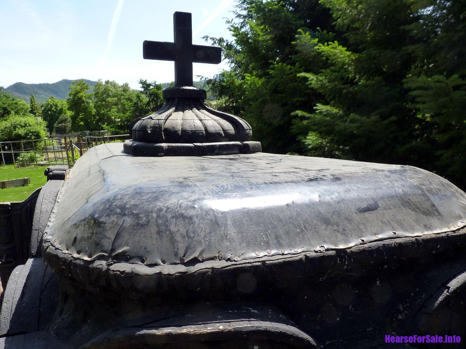 1875 Hand-carved Horse-drawn Hearse for a child or maiden. Cross on roof top of hearse.