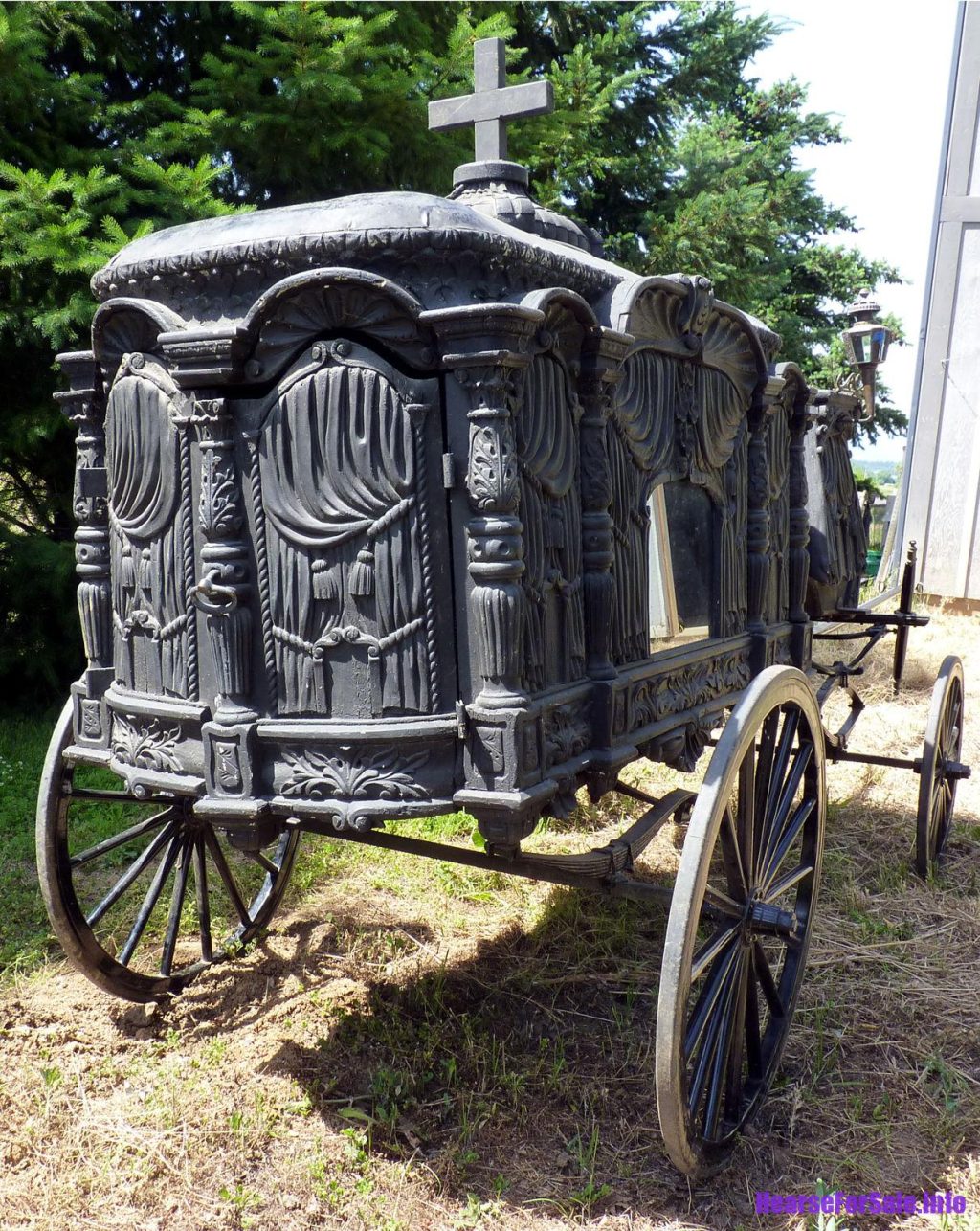 1875 Hand-carved Horse-drawn Hearse for a child or maiden. Rear carved wood panels.