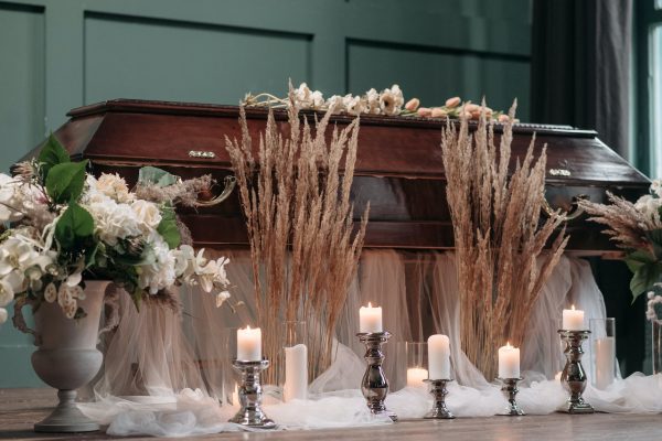 Flowers near a casket
